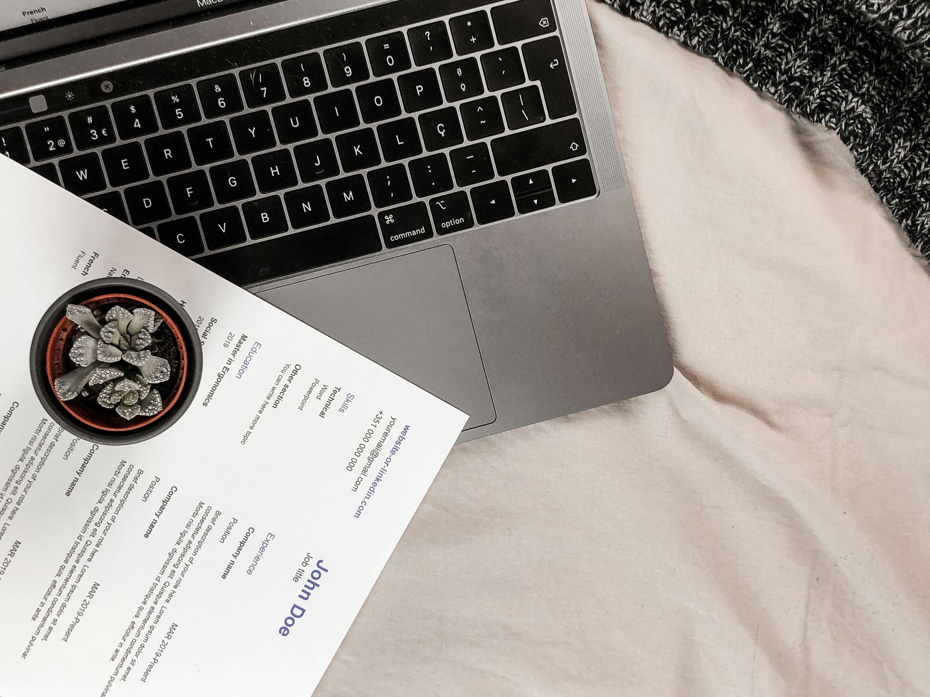 Resume with highlighted keywords and search magnifying glass showing strategic keyword optimization